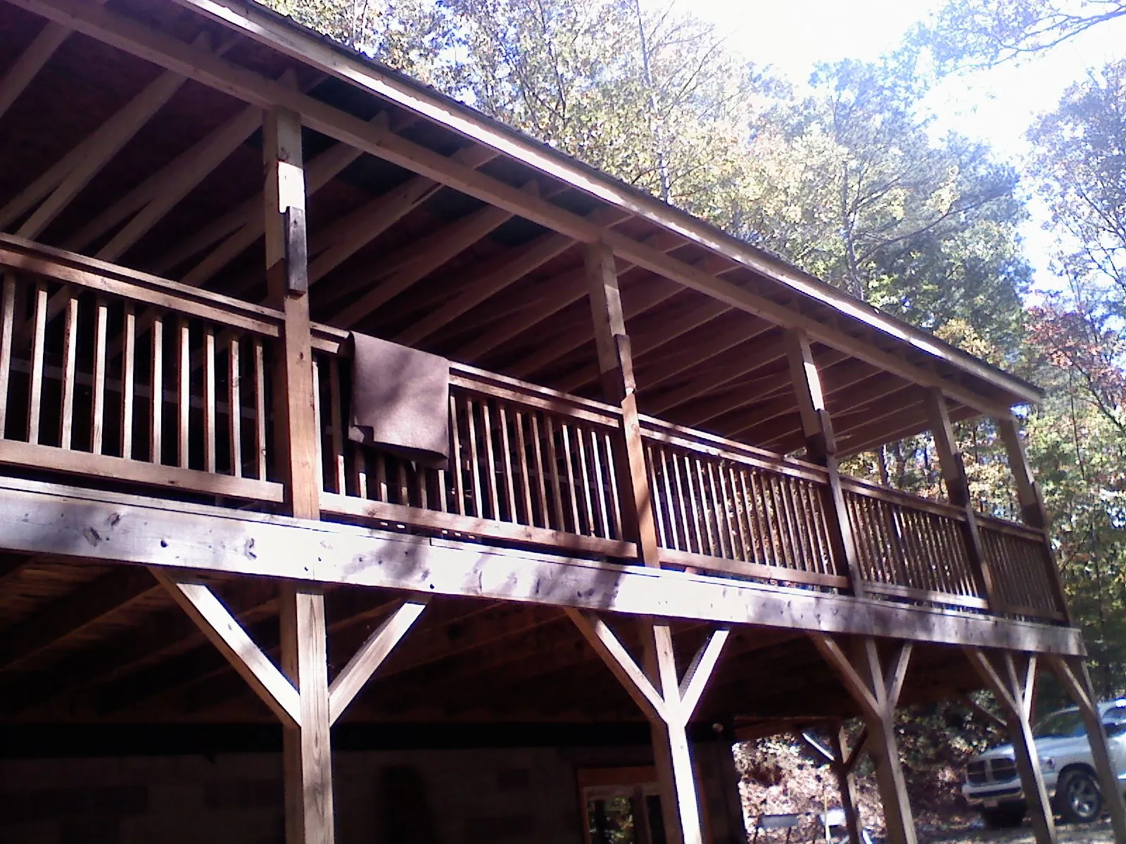 Timber framing under a new elevated porch and deck — Roof Leak Repair in Pearl by Roofing Brothers